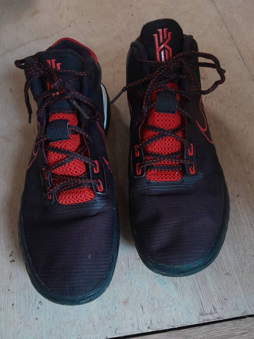 Nike Kyrie Flytrap 4 Black University Red (Category: Sneakers) located in Calamba. Submitted by ysabellascloset17 (Listing ID 1464570139, Image 2). Description: - Nike Kyrie 7 Basketball Shoes - Colorway: Black and Red - Size: US 9.5 (EUR 43, CM 27.5) - Ideal for playing basketball - Please check photos for detailed condition.