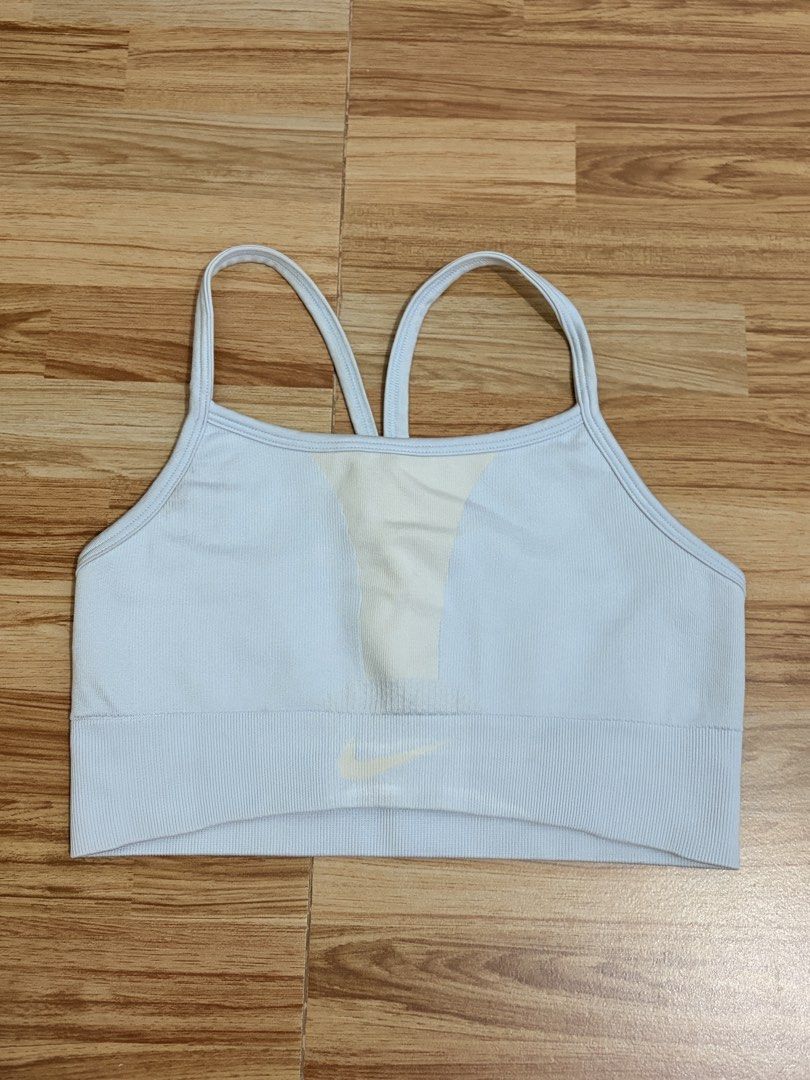 Nike Light Blue Sports Bra (Category: Activewear) located in Marikina City. Submitted by _bananahanaa (Listing ID 1464503110, Image 1). Description: - Light blue Nike sports bra - Racerback style - Front mesh panel for breathability - Comfortable ribbed band at the bottom - Versatile for workouts and everyday use.