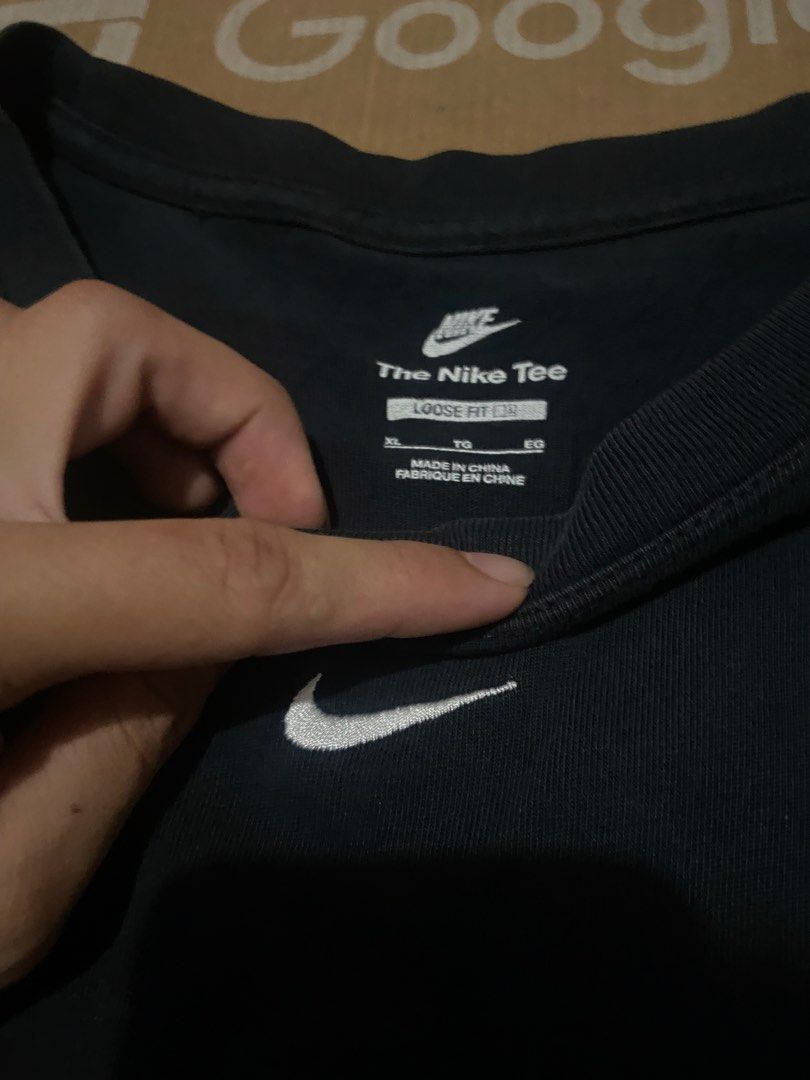 Nike Loose Fit Tee Black L (Category: Activewear) located in Manila. Submitted by mavcl (Listing ID 1464470883, Image 3). Description: - Black Nike T-Shirt - Size: L - Fit: Loose - Features: Classic Nike swoosh logo on chest - Ideal for: Casual wear - Origin: Made in China.