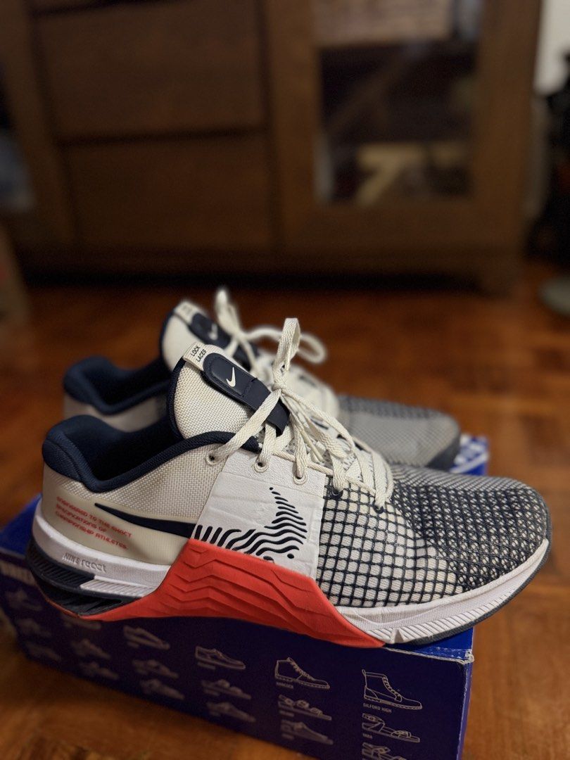 Nike Metcon 8 Training Shoes (Category: Sneakers) located in Paranaque City. Submitted by ferrewr (Listing ID 1464475743, Image 1). Description: - Good as new - Size: US 10 / EUR 44 - Colorway: White, Navy, and Grey - Ideal for workouts and lifting - Condition: Minor scuffs on soles from use, plenty of life remaining .