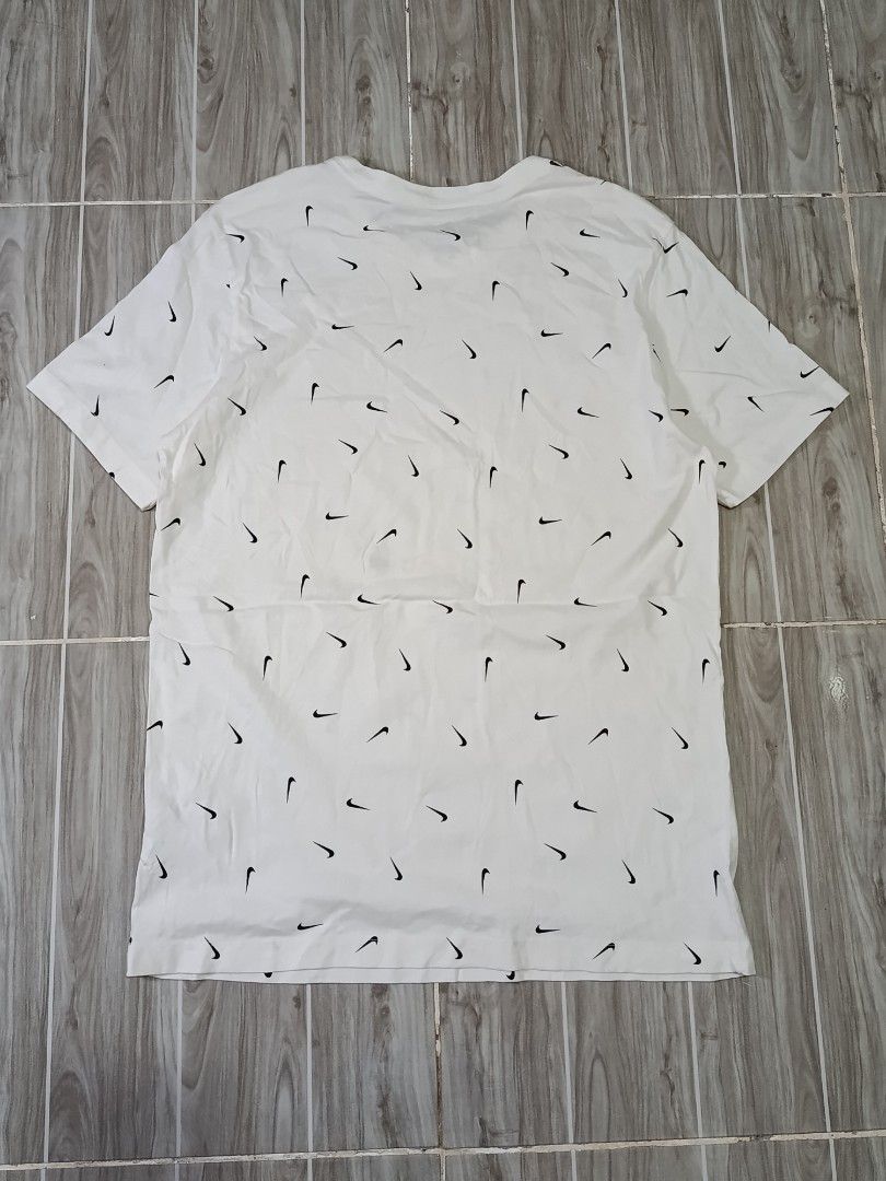 NIKE MULTI SWOOSH LOGO TSHIRT (freeshipping) (Category: Tshirts & Polo Shirts ) located in Quezon City. Submitted by gyl-stop (Listing ID 1464531703, Image 3). Description: free shipping 20 x 28.5 excellent condi cr: 9.8/10 issue: none.