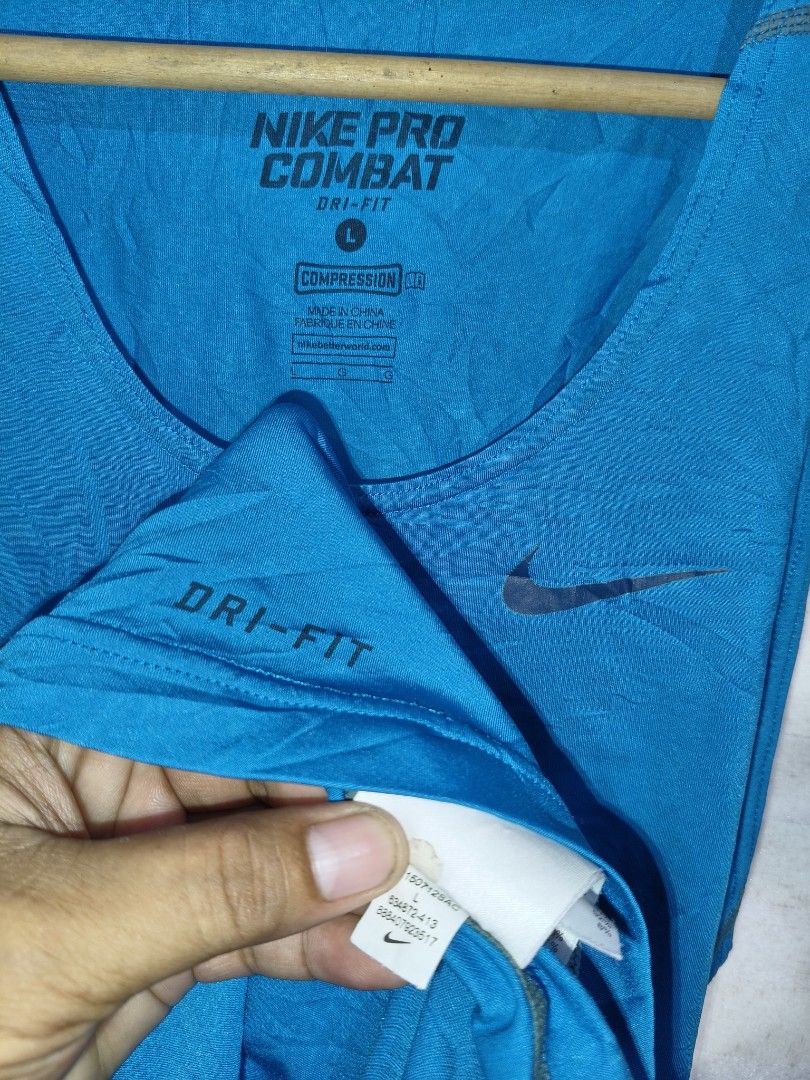 Nike Pro Combat Dri-Fit Compression Tank Top Size L (Category: Activewear) located in Compostela. Submitted by johnwilz1144610 (Listing ID 1464377747, Image 3). Description: - Blue Nike Pro Combat Tank Top - Dri-Fit material for sweat-wicking - Compression fit for support - Size: Large (L) - Ideal for workouts, training, and running.
