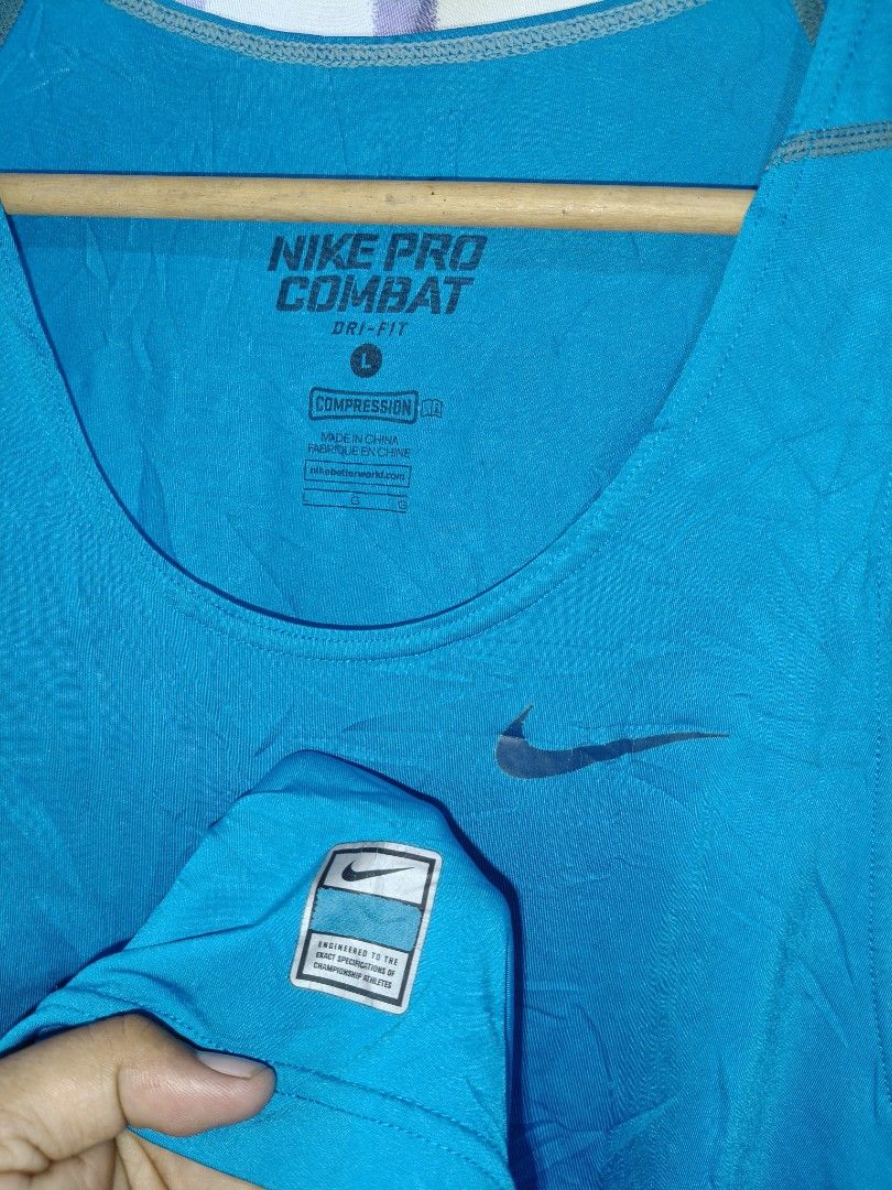 Nike Pro Combat Dri-Fit Compression Tank Top Size L (Category: Activewear) located in Compostela. Submitted by johnwilz1144610 (Listing ID 1464377747, Image 2). Description: - Blue Nike Pro Combat Tank Top - Dri-Fit material for sweat-wicking - Compression fit for support - Size: Large (L) - Ideal for workouts, training, and running.