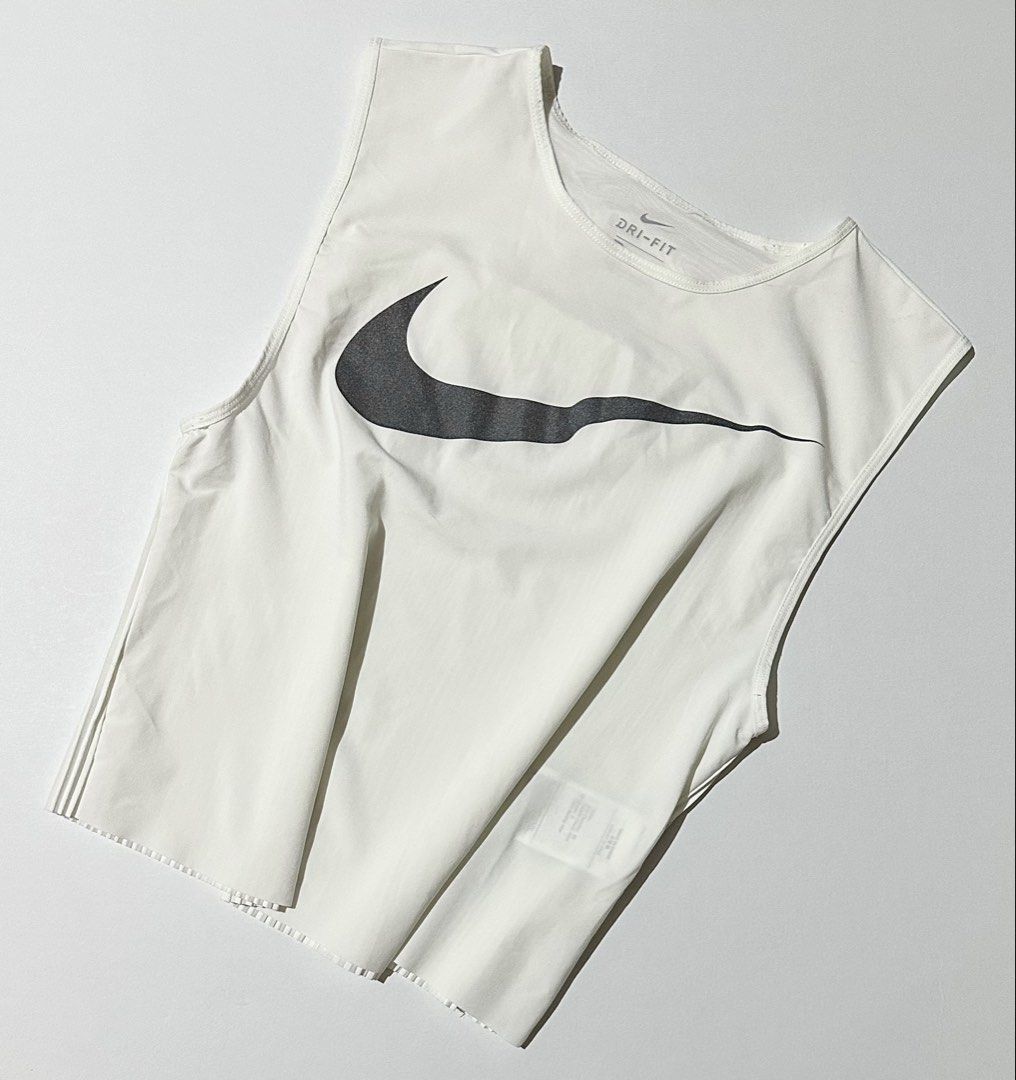 Nike Run Division Pleated Tank (Category: Activewear) located in Manila. Submitted by reclaimed.shop (Listing ID 1464435148, Image 1). Description: Description: A premium Nike Run Division performance tank designed for running and high-intensity training. Its lightweight mixed-media construction combines a smooth athletic fabric with a distinctive micro-pleated lower panel for enhanced airflow and movement. ✔️ Style: Nike W NK Run Division Tank P