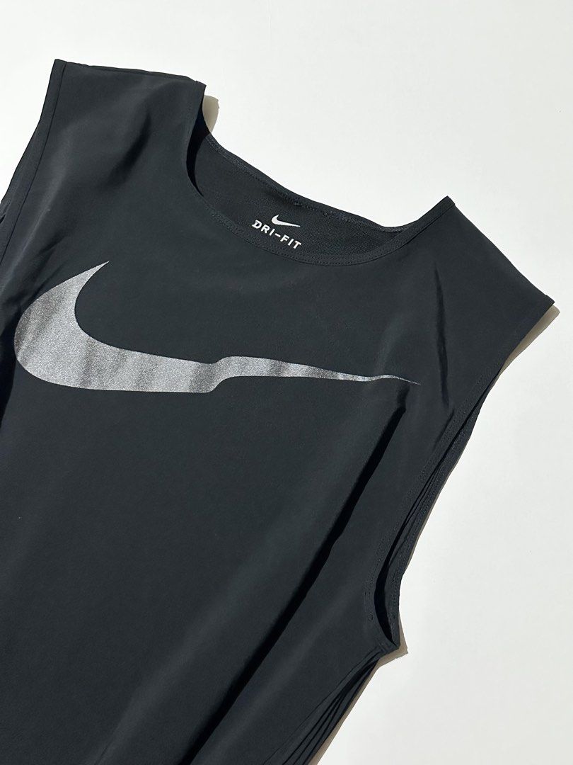 Nike Run Division Pleated Tank (Category: Activewear) located in Manila. Submitted by reclaimed.shop (Listing ID 1464446500, Image 2). Description: Description: A premium Nike Run Division performance tank designed for running and high-intensity training. Its lightweight mixed-media construction combines a smooth athletic fabric with a distinctive micro-pleated lower panel for enhanced airflow and movement. ✔️ Style: Nike W NK Run Division Tank P