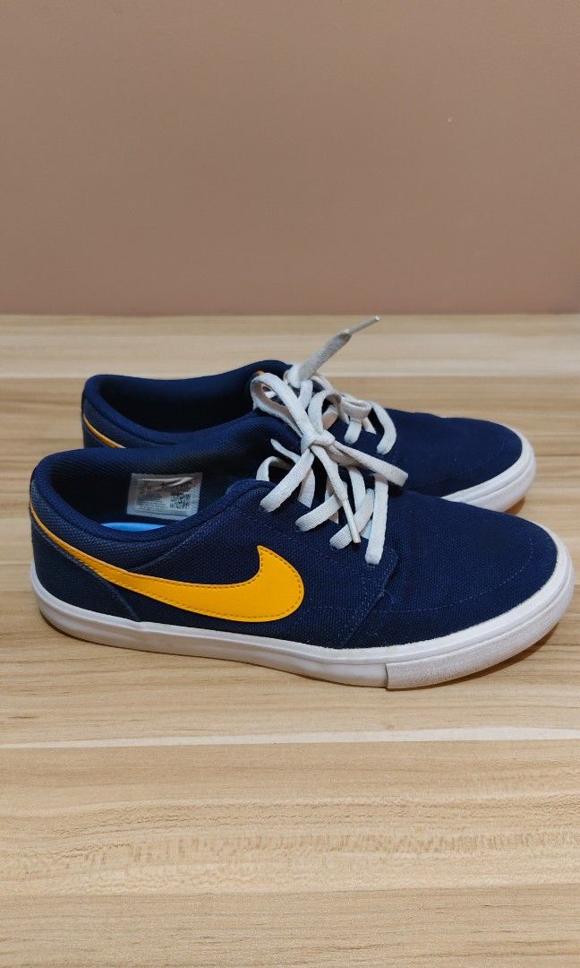 Nike SB Portman II Solar Canvas (Category: Casual Shoes) located in Tarlac. Submitted by katyparajels (Listing ID 1464399073, Image 2). Description: Nike SB Portmore II Solar Canvas (Blue & Yellow) ​Great skate shoes or casual everyday sneakers! Lightweight, durable, and super comfy with its Solarsoft sockliner. ​Condition: Lightly used (well-maintained, clean uppers and soles) ​Size: US 6 / EUR 38.5 ​Color: Blue / Yellow ​Inclusions: Shoes only 