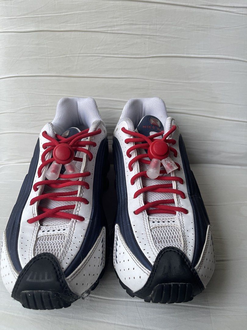 Nike Shox R4 4Y (Category: Babies & Kids Fashion) located in Paranaque City. Submitted by smconsul (Listing ID 1464463383, Image 2). Description: - Nike Shox R4 sneakers - Youth Size: 4Y - Colorway: White, Navy, and Red - Features classic Shox cushioning - Red laces with clear toggles - Soles show some wear, but plenty of life remaining - Ideal for everyday wear or light activities Loc: Las Pinas Delivery: j&t, lalamove, grab.