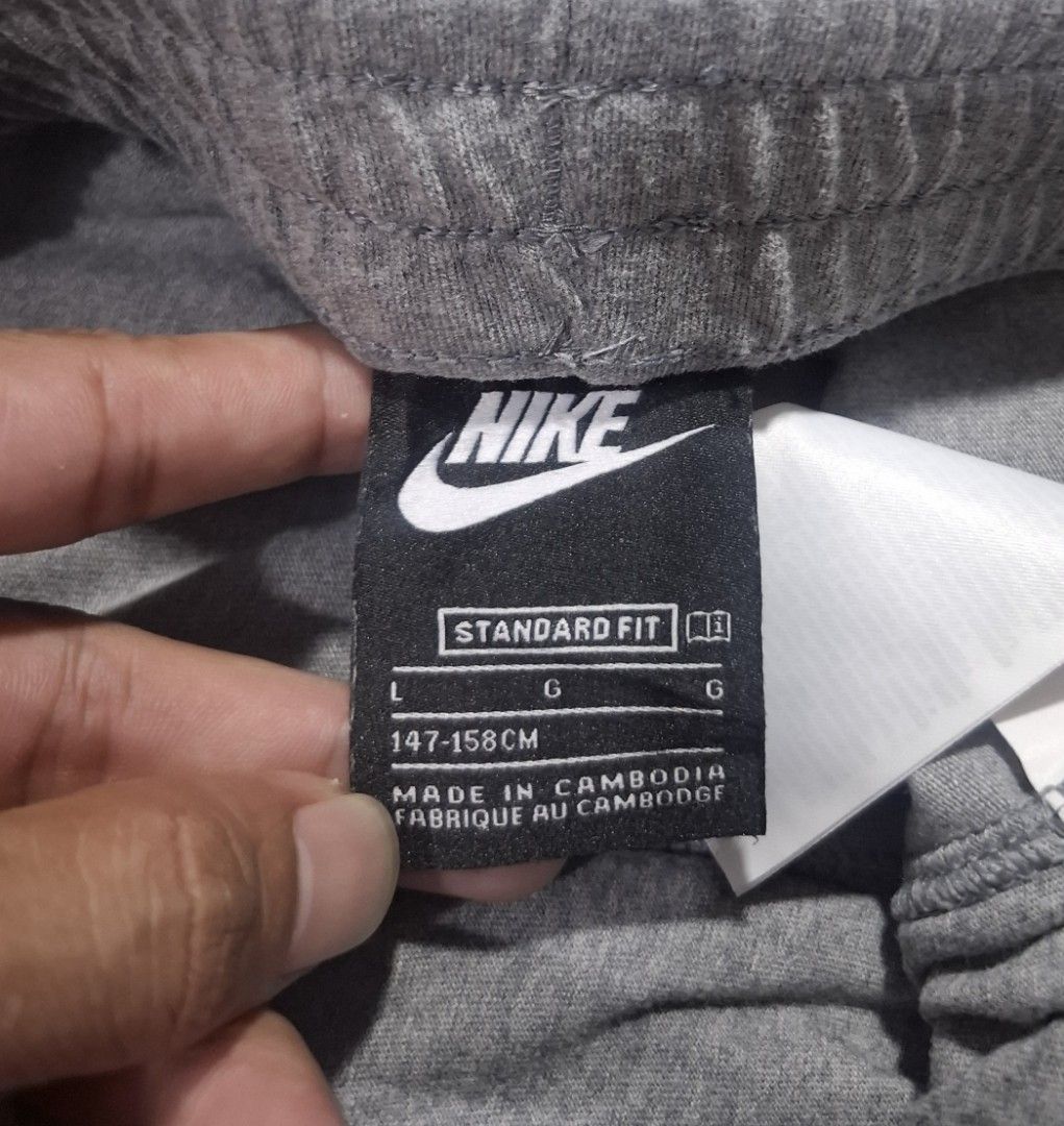 Nike Standard Fit Grey Shorts Size L (Category: Shorts) located in Sorsogon. Submitted by johnmichae69459 (Listing ID 1464499421, Image 3). Description: - Grey Nike shorts - Standard fit - Size L (fits 147-158cm) - 26 to 30 waistline - 18 lenght - Made in Cambodia - Elastic waistband with drawstring - Simple and comfy for everyday wear.