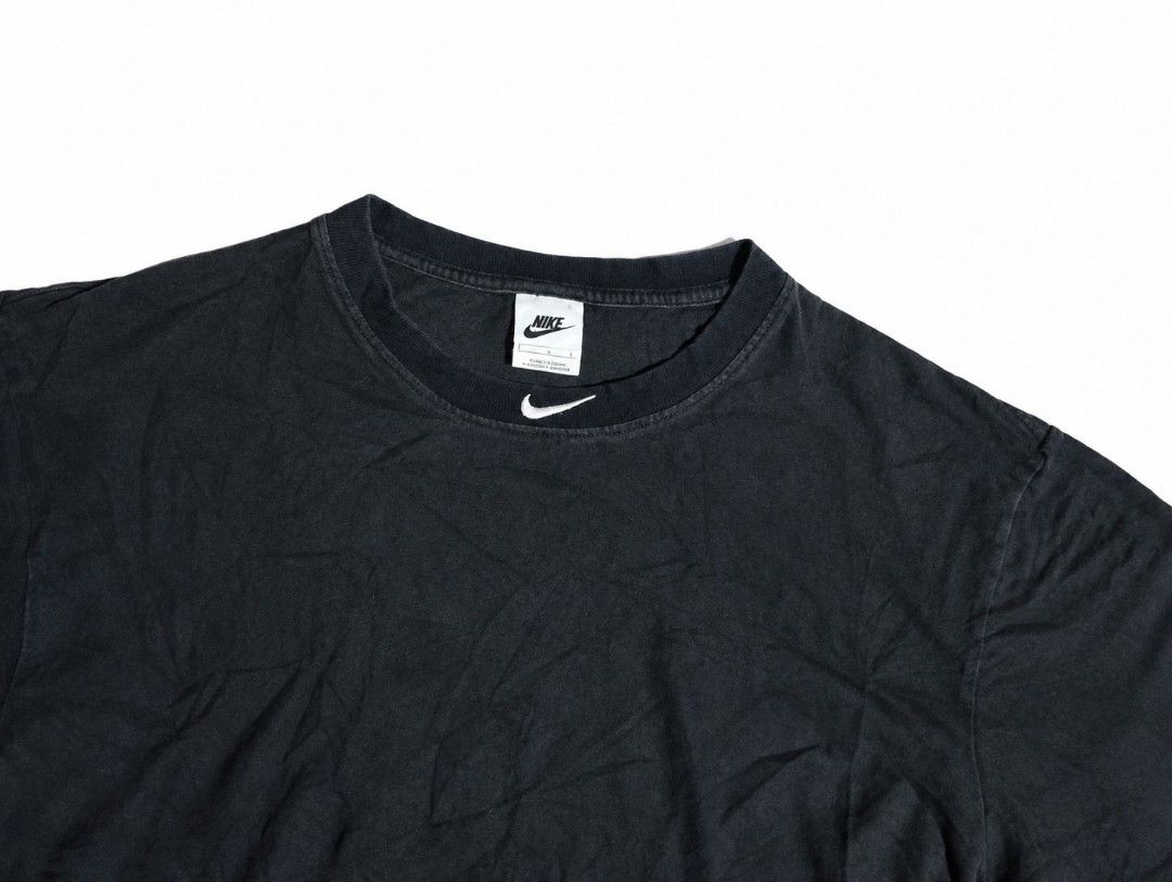 Nike T-SHIRT (Category: Formal Shirts) located in Iligan City. Submitted by jydsale. (Listing ID 1464447506, Image 2). Description: 🖤 NIKE BLACK NECK LOGO 🖤 👕 Original Nike T-shirt ✨ Classic crew neck design 🧵 Embroidered Nike logo detail on the neck 🖤 Clean and simple everyday style 👌 Comfortable and easy to pair with shorts, jeans, or joggers 🎨 Color: Black 📏 Size: L (based on tag) ✅ Good condition, with natural fabric wrinkles 👖 Perfe