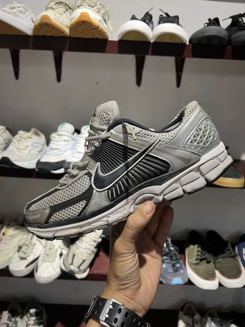 Nike Vomero 5 Running Shoes (Category: Sneakers) located in Bacolod City. Submitted by novymaesel14868 (Listing ID 1464494562, Image 2). Description: - Nike Vomero 5 running shoes - Color: Grey and Black - Features breathable mesh upper - Cushioned sole for excellent comfort - Ideal for running or everyday wear - Shows some signs of wear on soles and uppers.