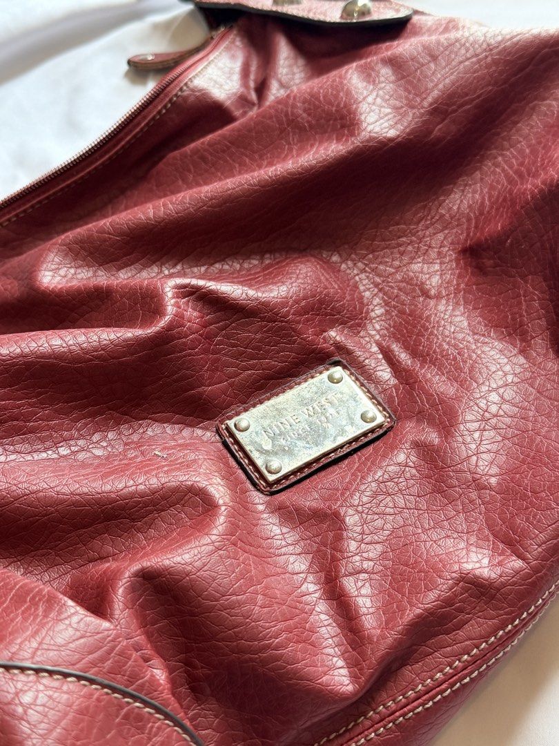 Nine west red shoulder bag | with minor flaw (Category: Shoulder Bags) located in Manila. Submitted by nlmcloset (Listing ID 1464402802, Image 2). Description: .