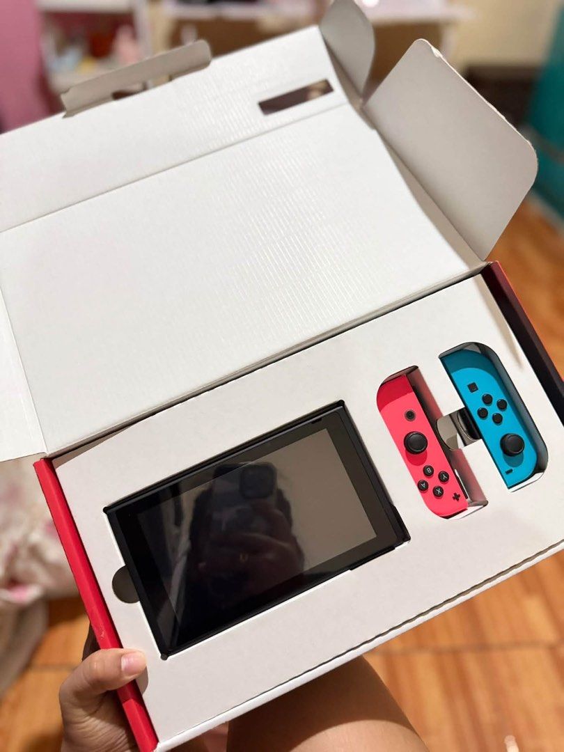 Nintendo Switch Mario Kart 8 Deluxe Bundle (Category: Nintendo) located in Makati City. Submitted by justtinabelles (Listing ID 1464465829, Image 2). Description: - Nintendo Switch Console Bundle - Includes Mario Kart 8 Deluxe game - Comes with Neon Red and Blue Joy-Cons - Includes a Black Nintendo Switch Carrying Case - All original packaging and accessories included - Ready for gaming adventures! - bought last July - RFS - barely used.