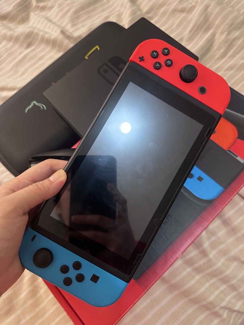 Nintendo Switch (Category: Nintendo) located in Manila. Submitted by biancamarie03 (Listing ID 1464370965, Image 2). Description: - Nintendo Switch Console - Original Joy-Cons included - Official Dock for TV play - Special Edition Pokemon Anniversary Case - All Original Packaging - Versatile: Play at home or on the go - Ideal for any gamer.
