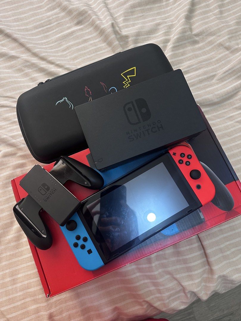 Nintendo Switch (Category: Nintendo) located in Manila. Submitted by biancamarie03 (Listing ID 1464370965, Image 1). Description: - Nintendo Switch Console - Original Joy-Cons included - Official Dock for TV play - Special Edition Pokemon Anniversary Case - All Original Packaging - Versatile: Play at home or on the go - Ideal for any gamer.
