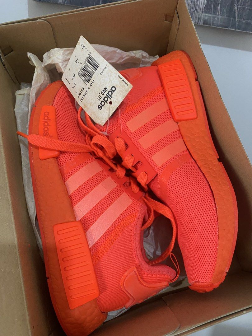 NMD (Category: Sneakers) located in Manila. Submitted by qamilluxe (Listing ID 1464419807, Image 3). Description: Brandnew Need full re-glue I can send video po para makita Nice to dko talaga nagamit nakatabi lang Pls check size sa box.