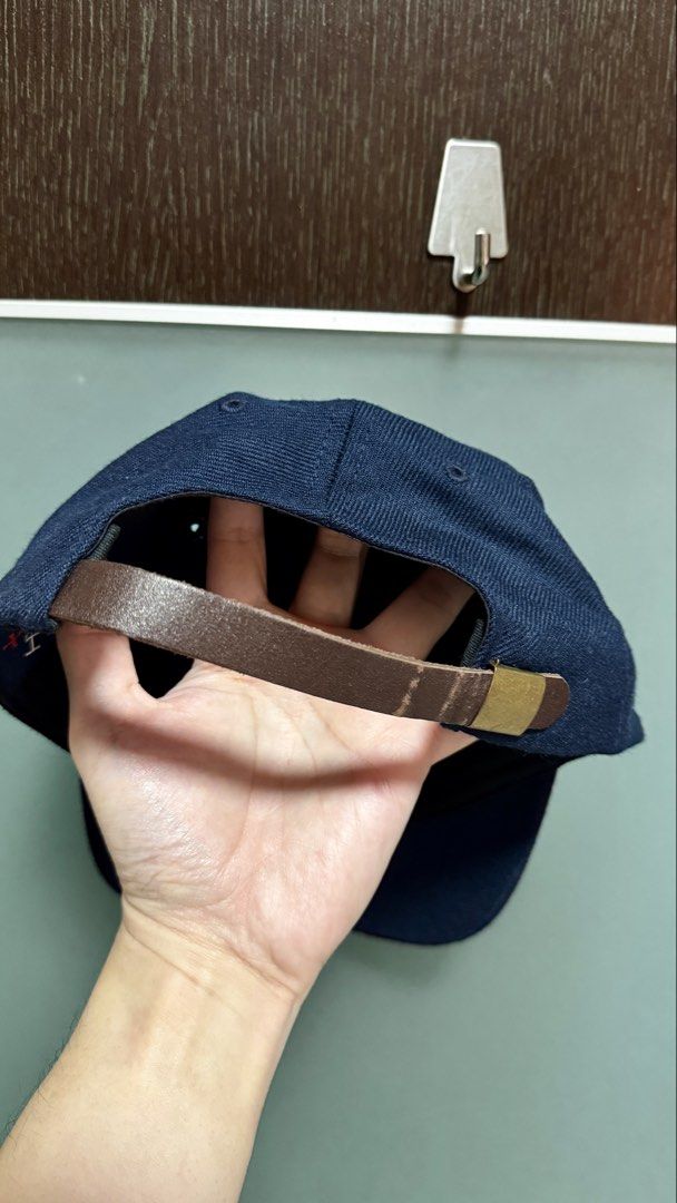 NOAH Navy Blue Wool Cap with Red 'N' Logo (Category: Caps & Hats) located in Mandaluyong City. Submitted by noms11 (Listing ID 1464464906, Image 3). Description: - Brand: NOAH - Color: Navy Blue - Material: 100% Wool - Origin: Made in Canada - Features: Red 'N' logo on front, adjustable leather strap at back - Style: Great for everyday wear.