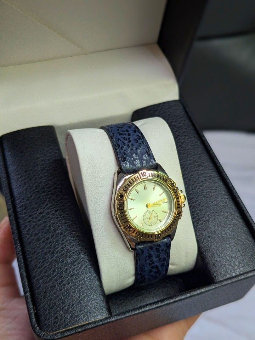 Noevir by Citizen Chronograph Watch (Category: Women's Watches) located in Quezon City. Submitted by nnncorner (Listing ID 1464435917, Image 2). Description: Noevir by Citizen 6L40-N116 Lunette Chronograph Watch 10/10 condition 100% Genuine Leather Dark Blue Textured Genuine Leather Strap Emerald Cabochon Crown Never been used / worn to show how it fits Chronograph is working No any issues 100% Original from Japan Japan Movement 20 peso coin size