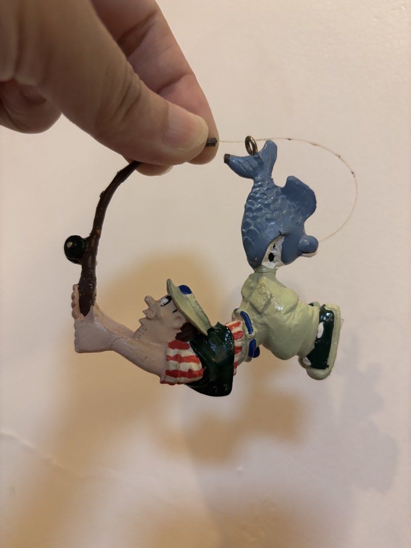 NOMA ornamotion Ornament - Caught One! (Category: Designer & Blind Box Toys) located in Quezon City. Submitted by onlinebazaare (Listing ID 1464507800, Image 3). Description: - Design: 'Caught One!' featuring a fisherman reeling in a fish - Comes in original packaging - Ideal for decorating your Christmas tree - not rotating.