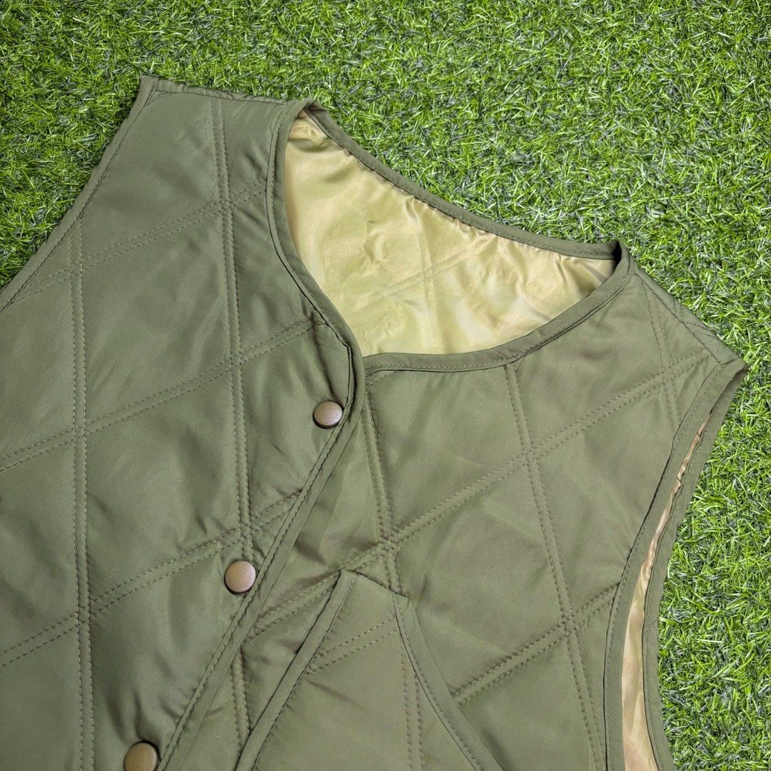 Olive | Quilted Liner Vest. (Category: Vests) located in Manila. Submitted by bypiecesandstories (Listing ID 1464479605, Image 3). Description: Olive | Quilted Liner Vest. 649 PHP 🧡 Perfect Condition Slightly Boxy Fit Can Fit — X Small to Medium Dimensions — W 22" L 23" A relaxed olive quilted liner vest that pairs effortlessly with different everyday pieces. A great layering staple for adding a little depth to your look while keeping it easy to