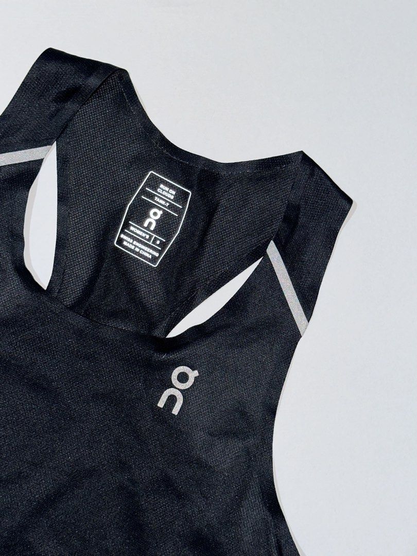On Performance Tank – Women’s | Black & Eclipse (Category: Activewear) located in Manila. Submitted by reclaimed.shop (Listing ID 1464426294, Image 3). Description: Designed for high-performance running and training, the On Performance Tank combines an ultra-lightweight feel with breathable, quick-drying fabric to keep you comfortable during warm-weather runs and intense workouts. ✔️ Ultra-lightweight Japanese sweat-wicking knit fabric ✔️ Quick-d