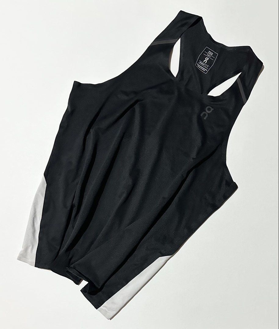 On Performance Tank – Women’s | Black & Eclipse (Category: Activewear) located in Manila. Submitted by reclaimed.shop (Listing ID 1464426294, Image 1). Description: Designed for high-performance running and training, the On Performance Tank combines an ultra-lightweight feel with breathable, quick-drying fabric to keep you comfortable during warm-weather runs and intense workouts. ✔️ Ultra-lightweight Japanese sweat-wicking knit fabric ✔️ Quick-d