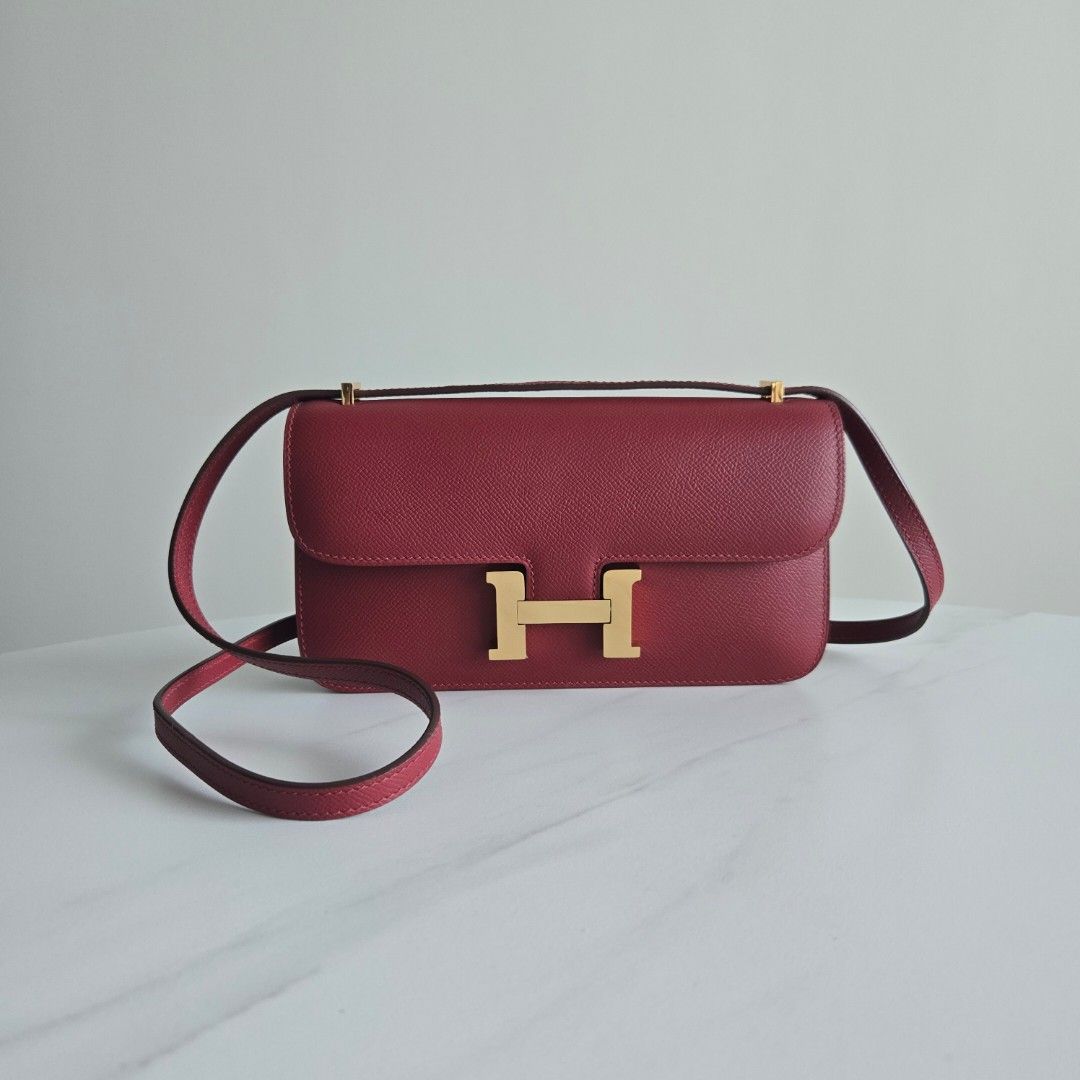 ON SALE ⭐️ Constance Elan (Category: Luxury Bags & Wallets) located in Paranaque City. Submitted by dclutterqueen (Listing ID 1464355430, Image 1). Description: Hermes Constance Elan (East West) in Rouge H color 💢Signs of use on the sealing on strap and a faint scratch on the back (see last 2 photos) 🌸 Comes with dustbag, no mirror included 💯 Genuine Epsom Leather 🇯🇵 Acquired preloved from Japan 👜 Measures approximately 25 x 14 cm.