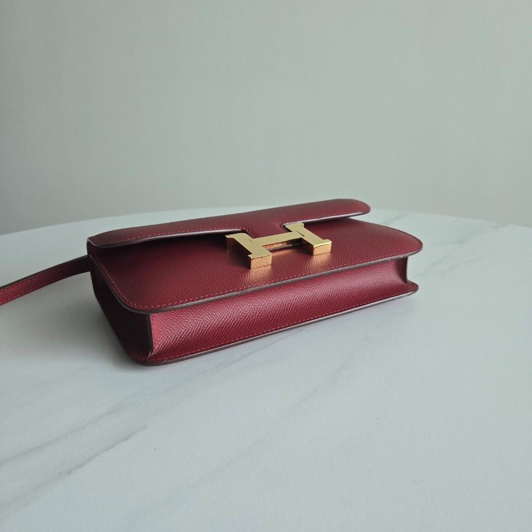 ON SALE ⭐️ Constance Elan (Category: Luxury Bags & Wallets) located in Paranaque City. Submitted by dclutterqueen (Listing ID 1464355430, Image 3). Description: Hermes Constance Elan (East West) in Rouge H color 💢Signs of use on the sealing on strap and a faint scratch on the back (see last 2 photos) 🌸 Comes with dustbag, no mirror included 💯 Genuine Epsom Leather 🇯🇵 Acquired preloved from Japan 👜 Measures approximately 25 x 14 cm.