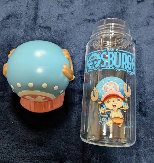 One Piece Mos Burger Chopper Water Bottle (Category: Water Bottles & Tumblers) located in Valenzuela. Submitted by sel000 (Listing ID 1464445080, Image 2). Description: - Officially licensed One Piece merchandise - Features a unique Tony Tony Chopper hat-shaped cap - Mos Burger collaboration design - Clear plastic bottle with blue print - Ideal for drinks on the go - Perfect gift for One Piece fans.