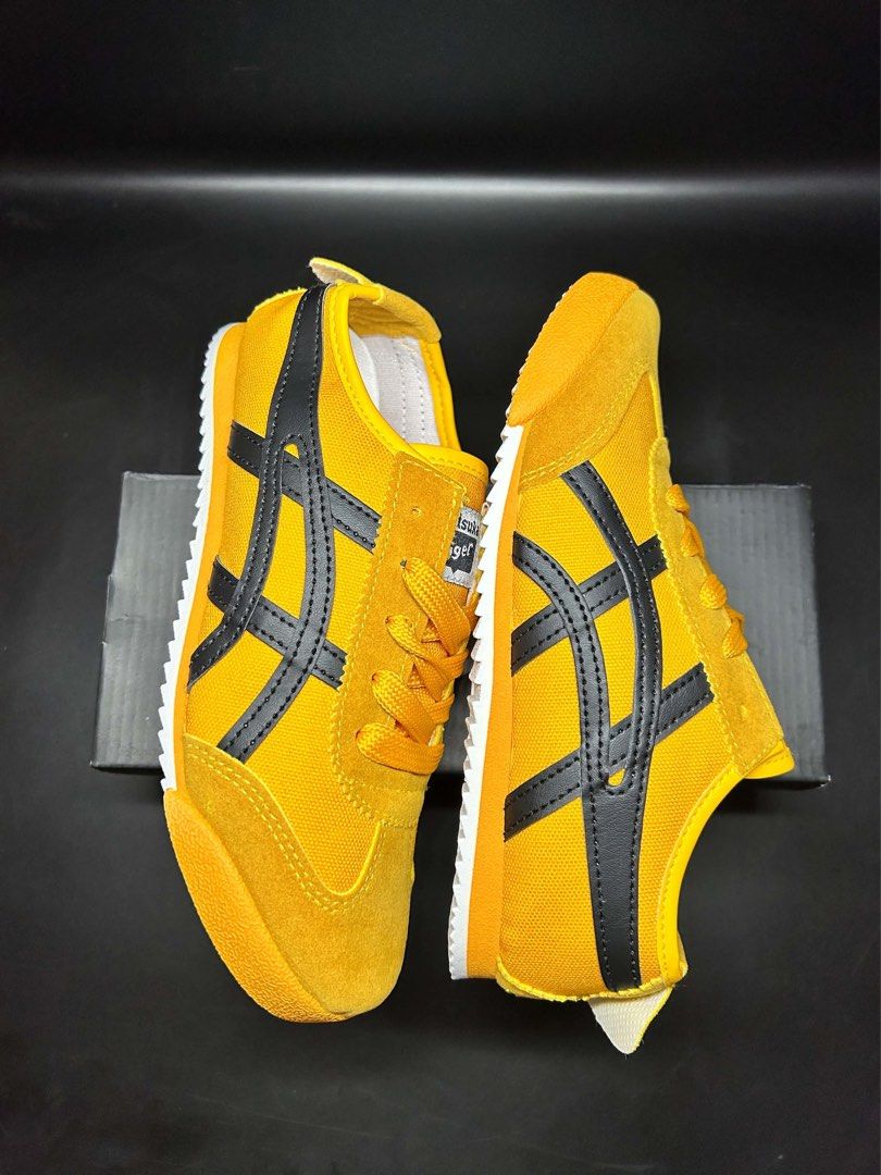 Onitsuka Tiger Mexico 66 Yellow Black (Category: Casual Shoes) located in Rizal. Submitted by sakre (Listing ID 1464519589, Image 2). Description: - Classic Onitsuka Tiger Mexico 66 - Bright yellow with black stripes - Suede and canvas upper - White sole - Great for casual wear.