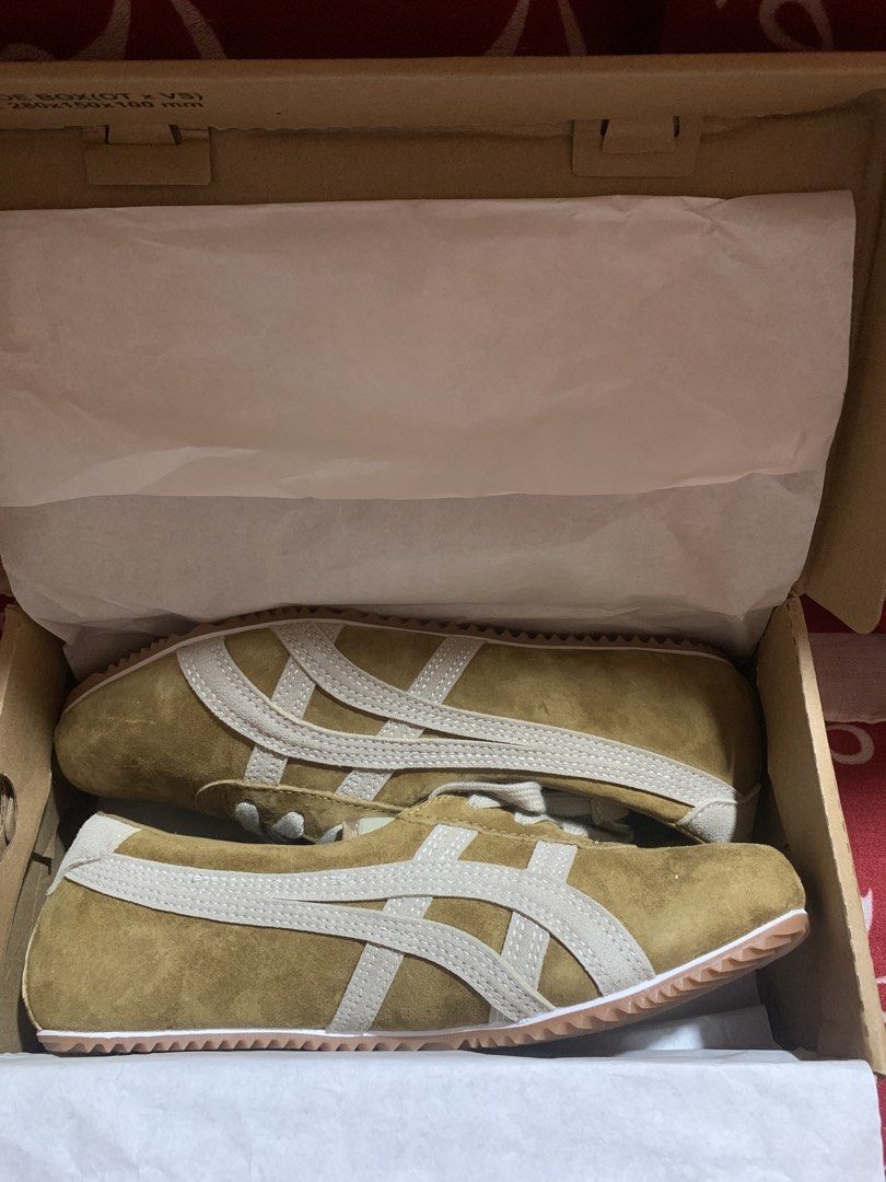 Onitsuka Tiger Sneakers (Category: Sneakers) located in Navotas City. Submitted by elaitems (Listing ID 1464521284, Image 1). Description: - Classic Onitsuka Tiger Mexico 66 sneakers - Comes with the box - Size: 39 - UNISEX - Never been used, recently purchased - Direct from factory - NEGOTIABLE PRICE ‼️.