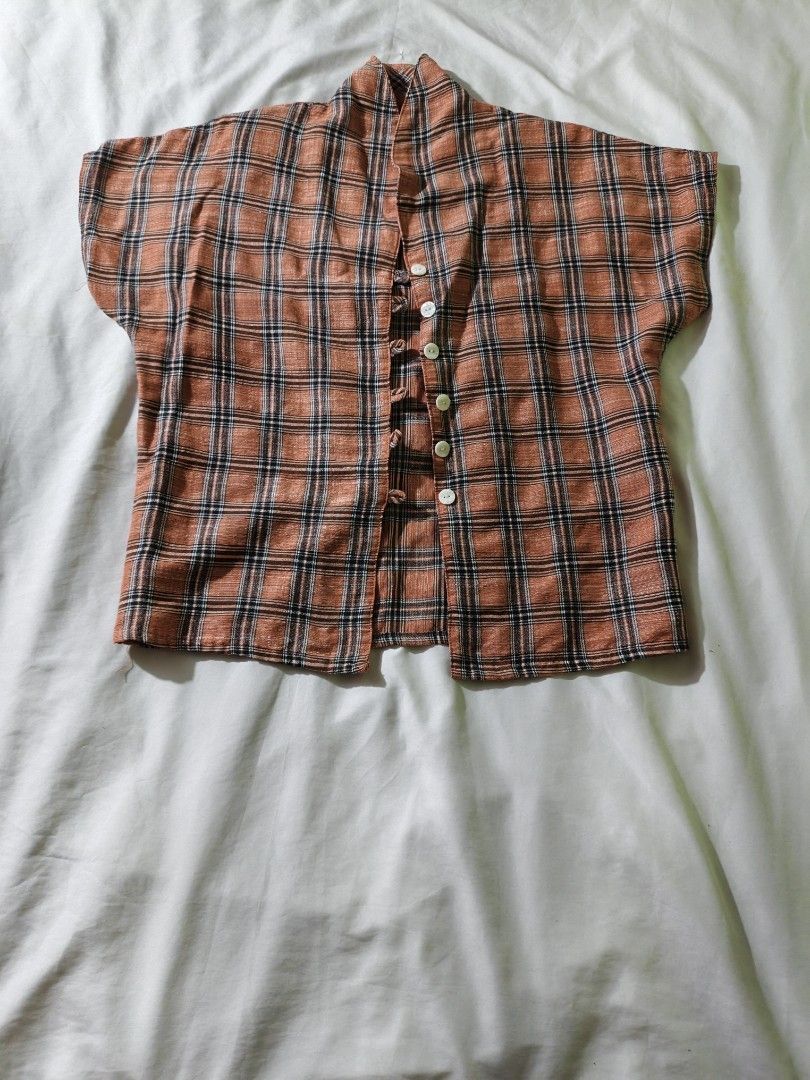 Orange Plaid Skirt and Top Set (Category: Sets or Coordinates) located in Manila. Submitted by ms_pamaqued (Listing ID 1464355130, Image 2). Description: - Adorable orange plaid set - Midi skirt with pleats - Matching short-sleeved top with button closure - Versatile: wear together or separately - Perfect for casual or dressed-up looks - Please check measurements for accurate fit.