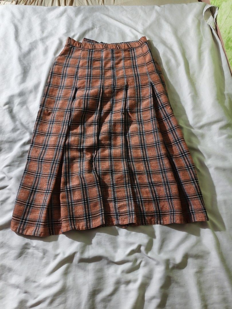 Orange Plaid Skirt and Top Set (Category: Sets or Coordinates) located in Manila. Submitted by ms_pamaqued (Listing ID 1464355130, Image 1). Description: - Adorable orange plaid set - Midi skirt with pleats - Matching short-sleeved top with button closure - Versatile: wear together or separately - Perfect for casual or dressed-up looks - Please check measurements for accurate fit.