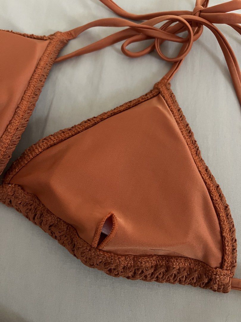 Orange Textured Two Piece Bikini Set (Category: Bikinis & Swimsuits) located in Paranaque City. Submitted by buyfelisha (Listing ID 1464406813, Image 3). Description: - Orange crochet bikini set - Triangle top with adjustable tie straps - Matching bottoms with adjustable tie sides - Size: S ✨ loc: Sucat Muntinlupa ✨ rfs: decluttering 💸 MOP: BDO, Unionbank, gcash, maya, seabank 🛵DELIVERY: Lalamove, Grab, J&T (Shouldered by buyer).