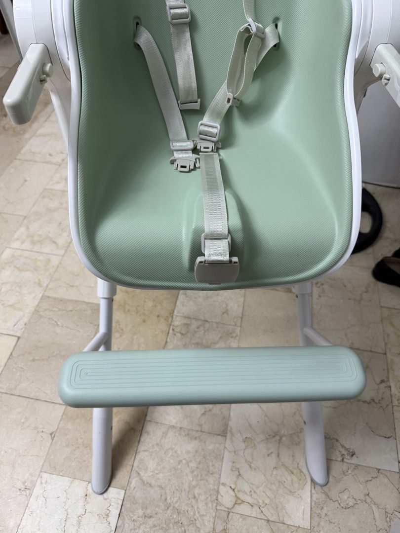 Oribel Cocoon High Chair - Sage Green (Category: Baby High Chairs) located in Cavite. Submitted by nicainics (Listing ID 1464405145, Image 3). Description: - Oribel Cocoon High Chair - Color: Sage Green with White accents - Safety: 5-point harness - Features: Adjustable tray, easy to clean - Convenience: Folds for storage - Ideal for: Meal times.