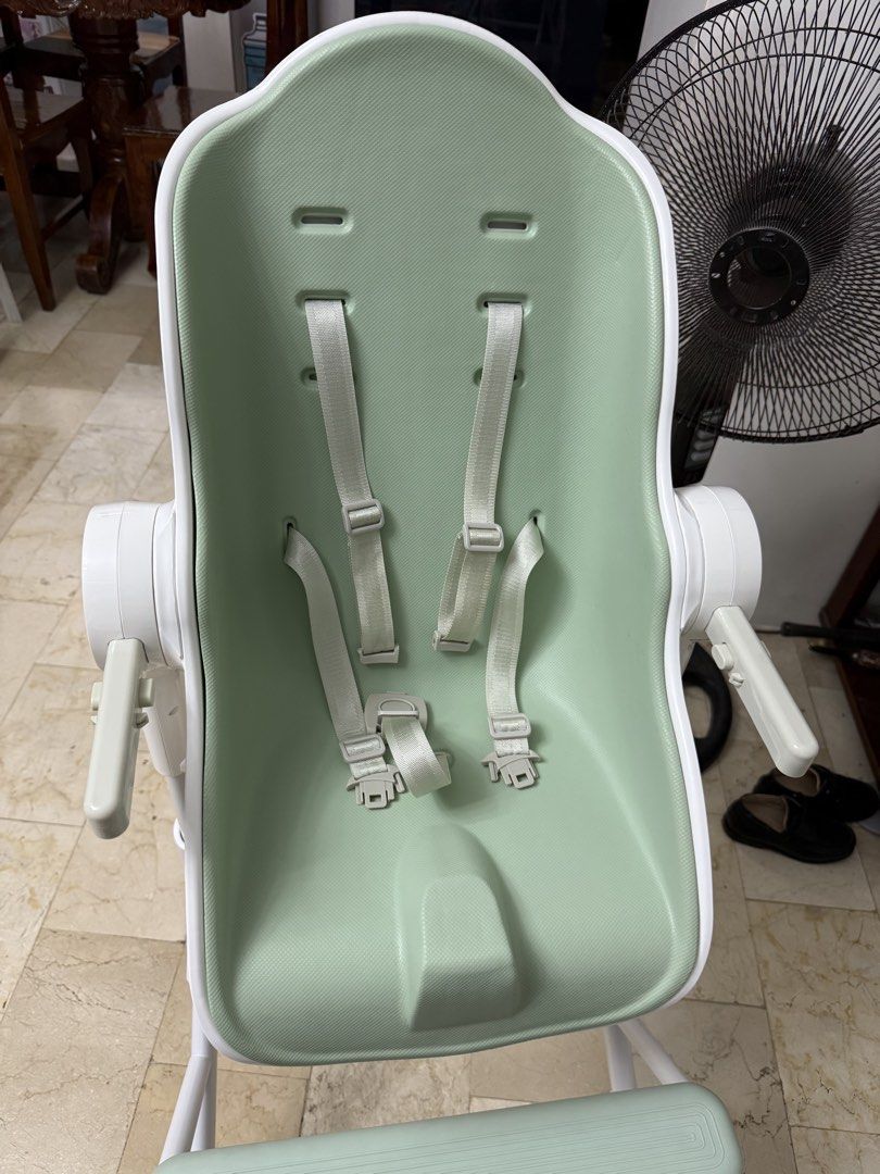 Oribel Cocoon High Chair - Sage Green (Category: Baby High Chairs) located in Cavite. Submitted by nicainics (Listing ID 1464405145, Image 2). Description: - Oribel Cocoon High Chair - Color: Sage Green with White accents - Safety: 5-point harness - Features: Adjustable tray, easy to clean - Convenience: Folds for storage - Ideal for: Meal times.