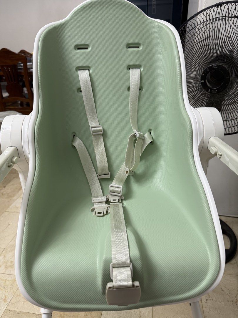Oribel Cocoon High Chair - Sage Green (Category: Baby High Chairs) located in Cavite. Submitted by nicainics (Listing ID 1464405145, Image 1). Description: - Oribel Cocoon High Chair - Color: Sage Green with White accents - Safety: 5-point harness - Features: Adjustable tray, easy to clean - Convenience: Folds for storage - Ideal for: Meal times.