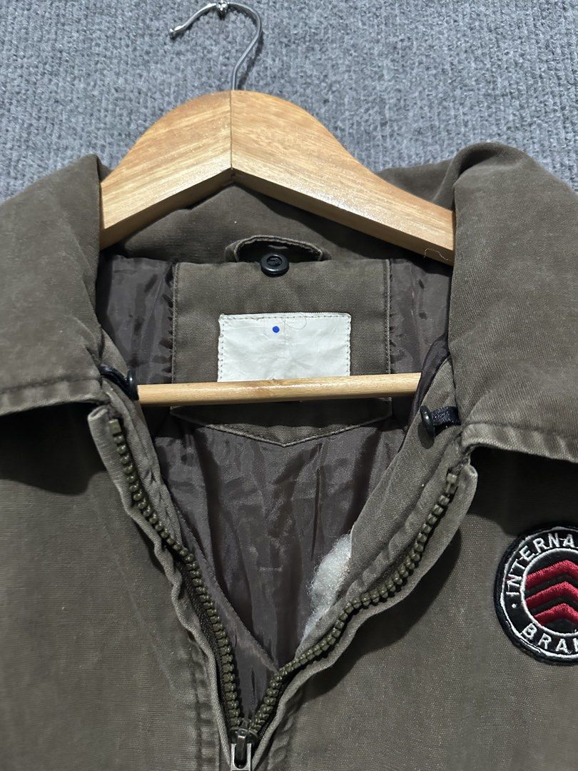 Original Brand Bomber Jacket (Category: Coats, Jackets and Outerwear) located in Villasis. Submitted by justinramosonfb (Listing ID 1464508054, Image 2). Description: - Stylish brown bomber jacket with unique patches. - Front zipper closure for easy wear. - Ribbed cuffs and hem for a comfortable fit. - Soft inner lining for added comfort. - Ideal for everyday casual styling..