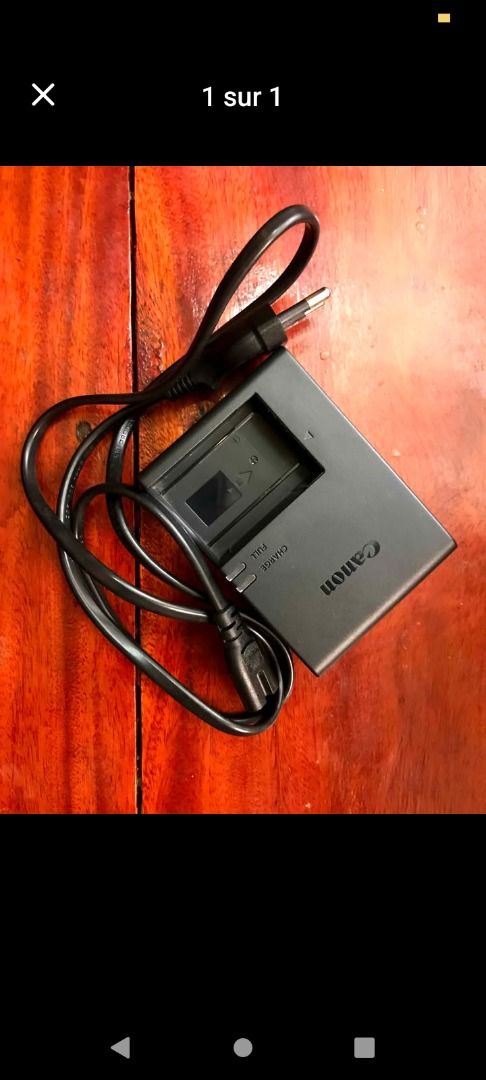 Original Canon EOS R8, LC-E17 Battery Charger (Category: Batteries & Chargers) located in Caloocan City. Submitted by cosmictiger_05d9b3 (Listing ID 1464485067, Image 1). Description: Genuine Canon LC-E17 charger for LP-E17 batteries. - Excellent condition - Fully working - Original Canon product.