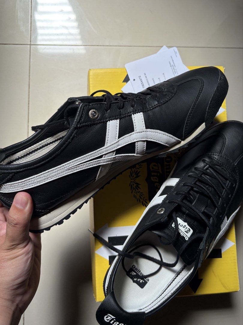 ORIGINAL Onitsuka Tiger Mexico 66 SD Black/White (Category: Sneakers) located in Cebu City. Submitted by itskoko (Listing ID 1464367829, Image 3). Description: Selling my pre-loved 💯 ORIGINAL Onitsuka Tiger Mexico 66 SD in black with white stripes color way Size 42 mens. Only used 4-5 times, still looks brand new and pristine . Been using it with crease protectors to avoid creases! GOOD AS NEW!!!! Bought it originally from Japan Onitsuka Flagshi