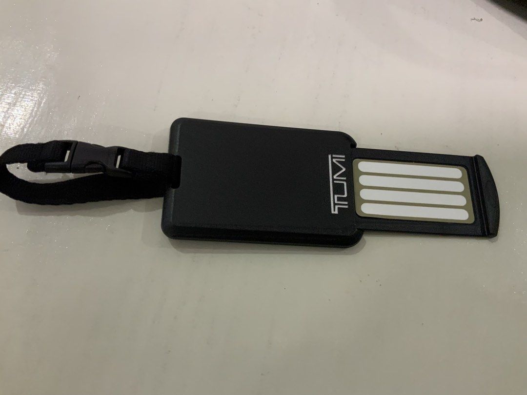 Original Tumi Black Luggage Tag with Strap and Insert (Category: Luggage) located in San Fernando. Submitted by destinydeals04 (Listing ID 1464568409, Image 1). Description: - Original tumi Genuine plastic Black Tumi luggage tag - Features a secure strap and buckle for easy attachment - Convenient slide-out insert for your contact information - Made from durable, travel-ready material - Essential for keeping your luggage easily identifiable Excel