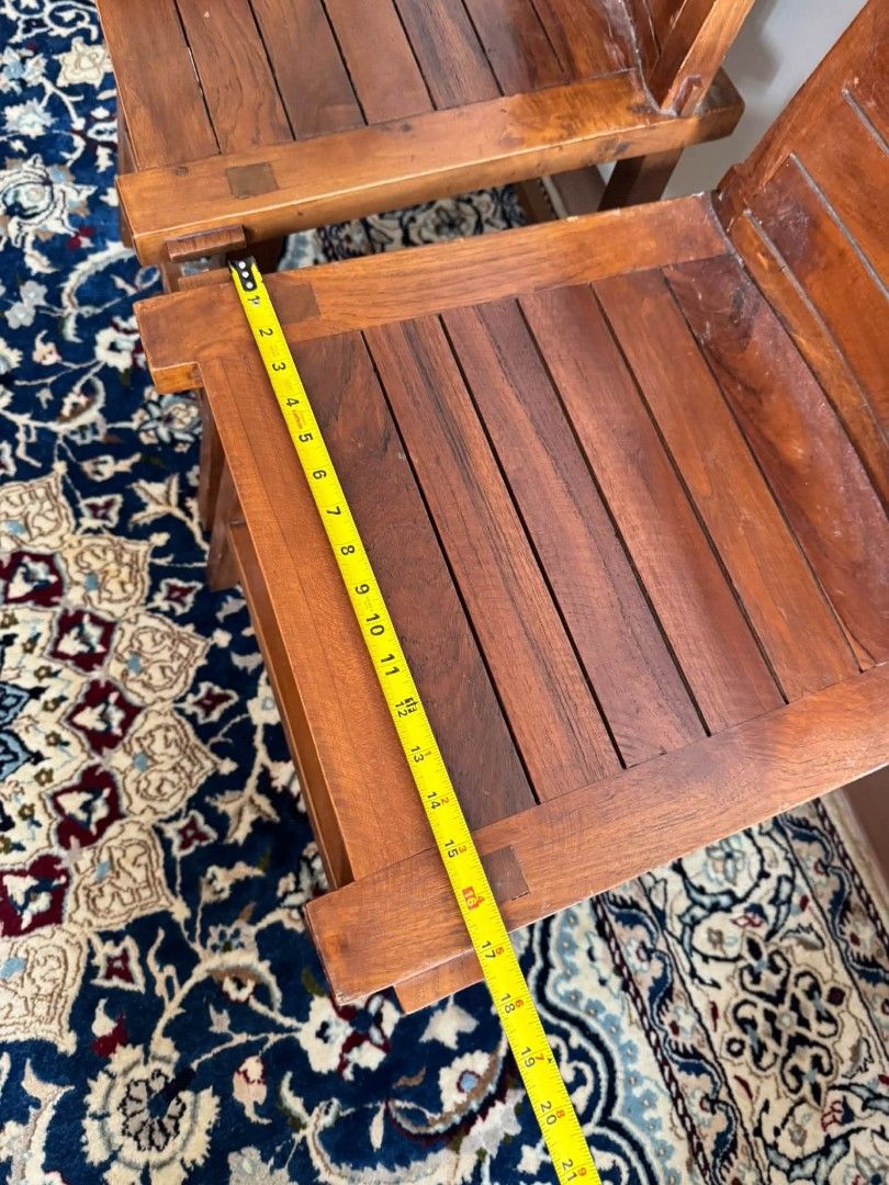 Pair of Teak Slatted Chairs (Category: Chairs) located in Quezon City. Submitted by dannikkishoppe2 (Listing ID 1464382694, Image 3). Description: Pair of Teak Slatted Chairs ‼️₱7500‼️ Solid wood In good condition Please manage your expectations as there might be minimal flaws. Color may vary due to lighting, it may appear darker or lighter in person. Check photos first before buying. Please refrain from purchasing if you are particular about USE