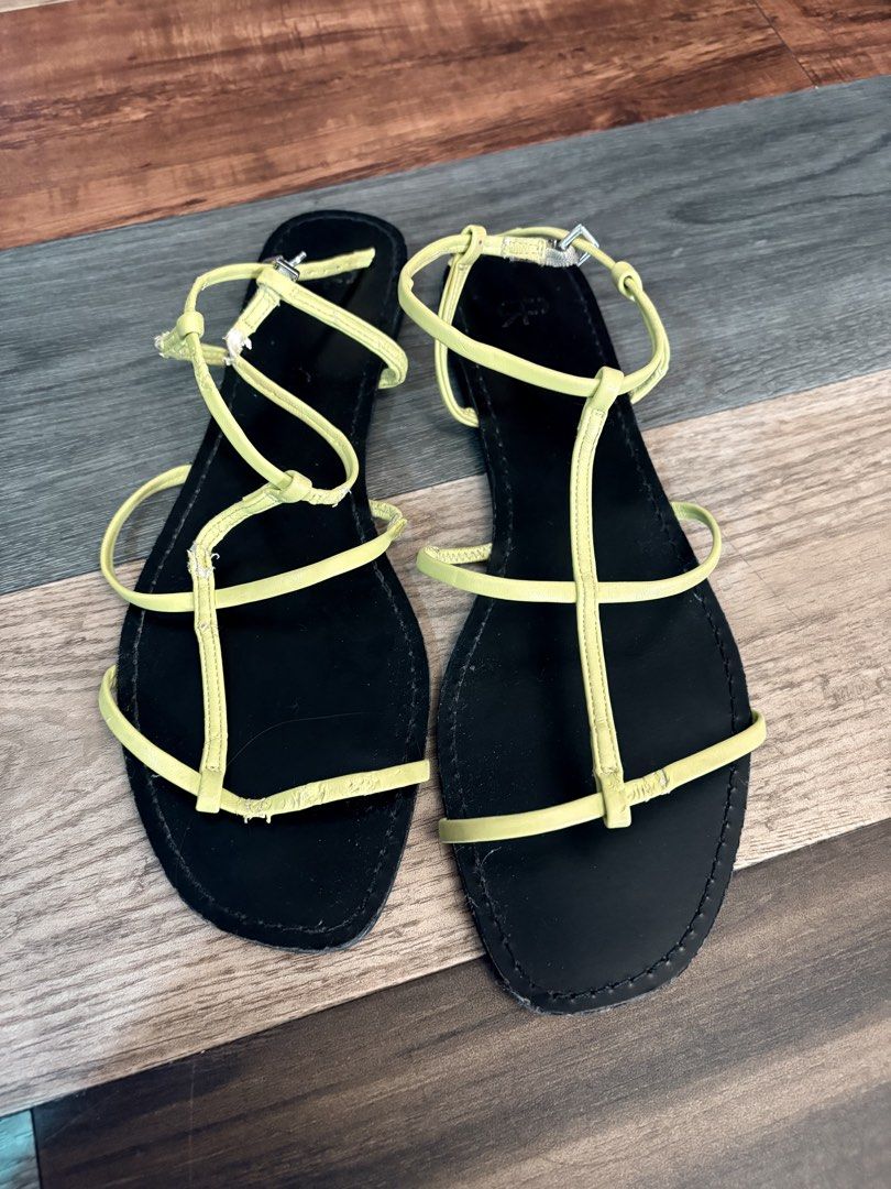 PARFOIS Yellow-Green Strappy Flat Sandals - Size 41 (Category: Sandals) located in Manila. Submitted by manila.decor.ph (Listing ID 1464423949, Image 1). Description: PARFOIS Yellow-Green Strappy Flat Sandals - Size 41 ✨ Brand: PARFOIS ✨ Size: EU 41 💛 Lime/yellow-green color 🩴 Flat sandals with delicate multi-strap design ✨ Adjustable ankle straps ✨ Stylish and easy to pair with casual outfits 📌 Pre-loved. Please check photos carefully for the