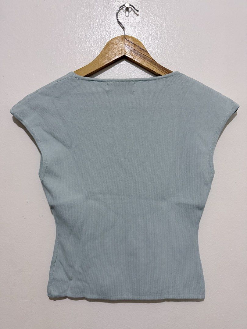 Pastel Blue Square Neck Cap Sleeve Top (Category: Sleeveless) located in Caloocan City. Submitted by ashpreloves (Listing ID 1464380792, Image 2). Description: - Light blue ribbed knit top - Brand: We Me - Square neckline - Cap sleeves - Fitted silhouette - Versatile for layering or wearing solo - Easy to style with jeans or skirts.