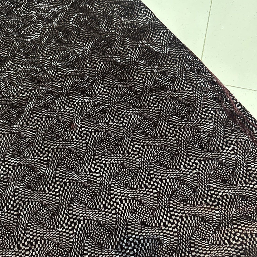 Patterned Velvet Midi Skirt (Category: Skirts) located in Manila. Submitted by filoved__ (Listing ID 1464443678, Image 3). Description: - Brand: Bishop Devinette - Has a side zipper enclosure and button - [Measurements in inches] Waist: 27-29, Length: 25 - Slight flaw by the zipper, can be repaired - Stretchy and flowy at the ends but more of a pencil skirt silhouette - Color is a darker burgundy in real life - Can also be styled as a mini dress!