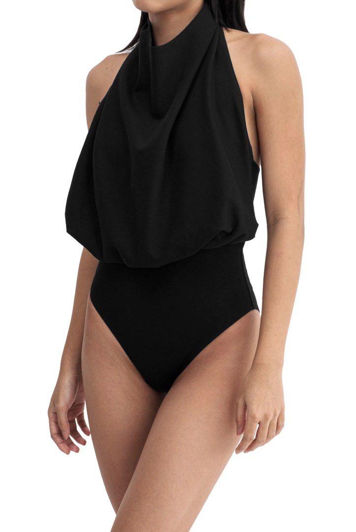 PATTON STUDIO Draped Halter Bodysuit in Black (Category: Sleeveless) located in Makati City. Submitted by zclutters (Listing ID 1464374064, Image 2). Description: Bought from Patton Rockwell. Used only once. Little advisory 🤍 With the recent increase in scam issues on Carousell, I’ll be requiring payment first before shipping. For everyone’s safety, I’ll also be the one to book the delivery via Lalamove. Rest assured, you can check my Carousell 