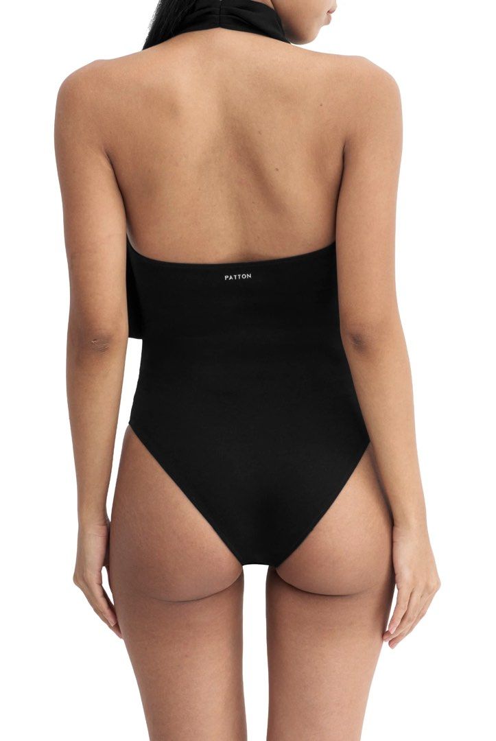 PATTON STUDIO Draped Halter Bodysuit in Black (Category: Sleeveless) located in Makati City. Submitted by zclutters (Listing ID 1464374064, Image 3). Description: Bought from Patton Rockwell. Used only once. Little advisory 🤍 With the recent increase in scam issues on Carousell, I’ll be requiring payment first before shipping. For everyone’s safety, I’ll also be the one to book the delivery via Lalamove. Rest assured, you can check my Carousell 