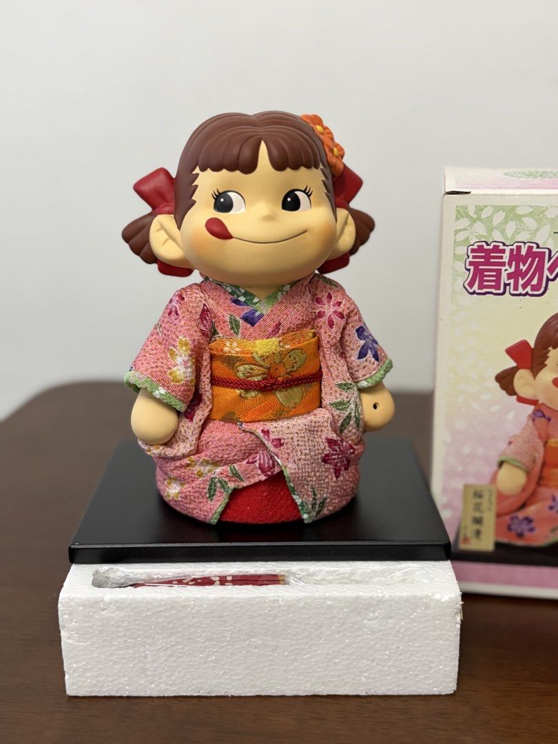 Peko Chan Kimono Ceramic Figure from Japan (Category: Action & Battle Toys) located in Binan City. Submitted by ia.collectibles (Listing ID 1464568090, Image 2). Description: Missing small wooden signage board.