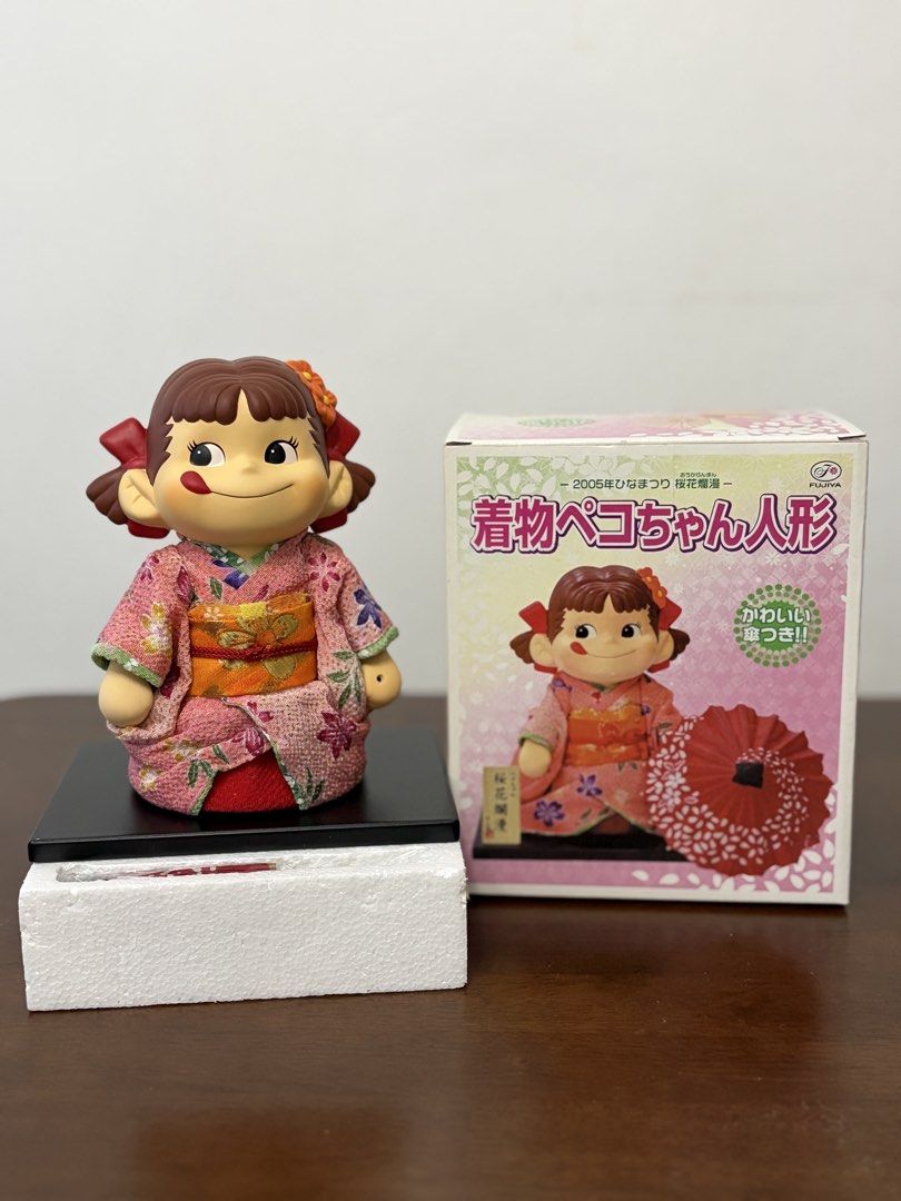 Peko Chan Kimono Ceramic Figure from Japan (Category: Action & Battle Toys) located in Binan City. Submitted by ia.collectibles (Listing ID 1464568090, Image 1). Description: Missing small wooden signage board.