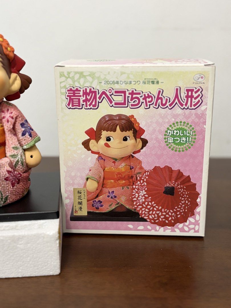 Peko Chan Kimono Ceramic Figure from Japan (Category: Action & Battle Toys) located in Binan City. Submitted by ia.collectibles (Listing ID 1464568090, Image 3). Description: Missing small wooden signage board.