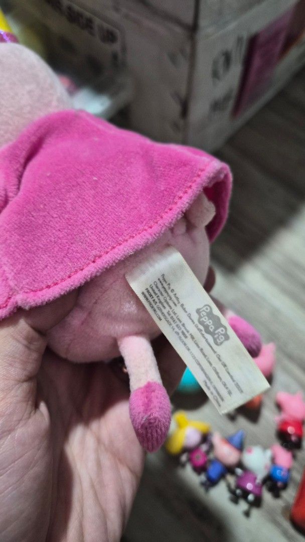 Peppa Pig Plush Toy, Figures, and Accessories Set (Category: Plushies & Soft Toys) located in Manila. Submitted by bellesrelove (Listing ID 1464385927, Image 3). Description: - Bundle of Peppa Pig toys - Includes a Peppa Pig plush with a magic wand - Several small Peppa Pig figures, some with hats and accessories - Comes with a red toy vehicle - Ideal for any Peppa Pig enthusiast - All items are from the official Peppa Pig series.